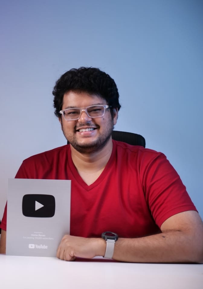 Nikhil Bhansali with the YouTube Silver Play Button awarded to Home Banao